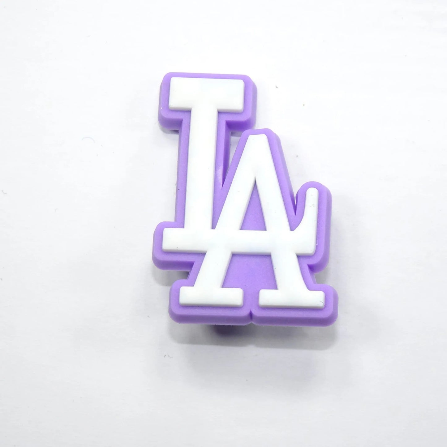 La Stylised Logo White On Purple Shoe Charm