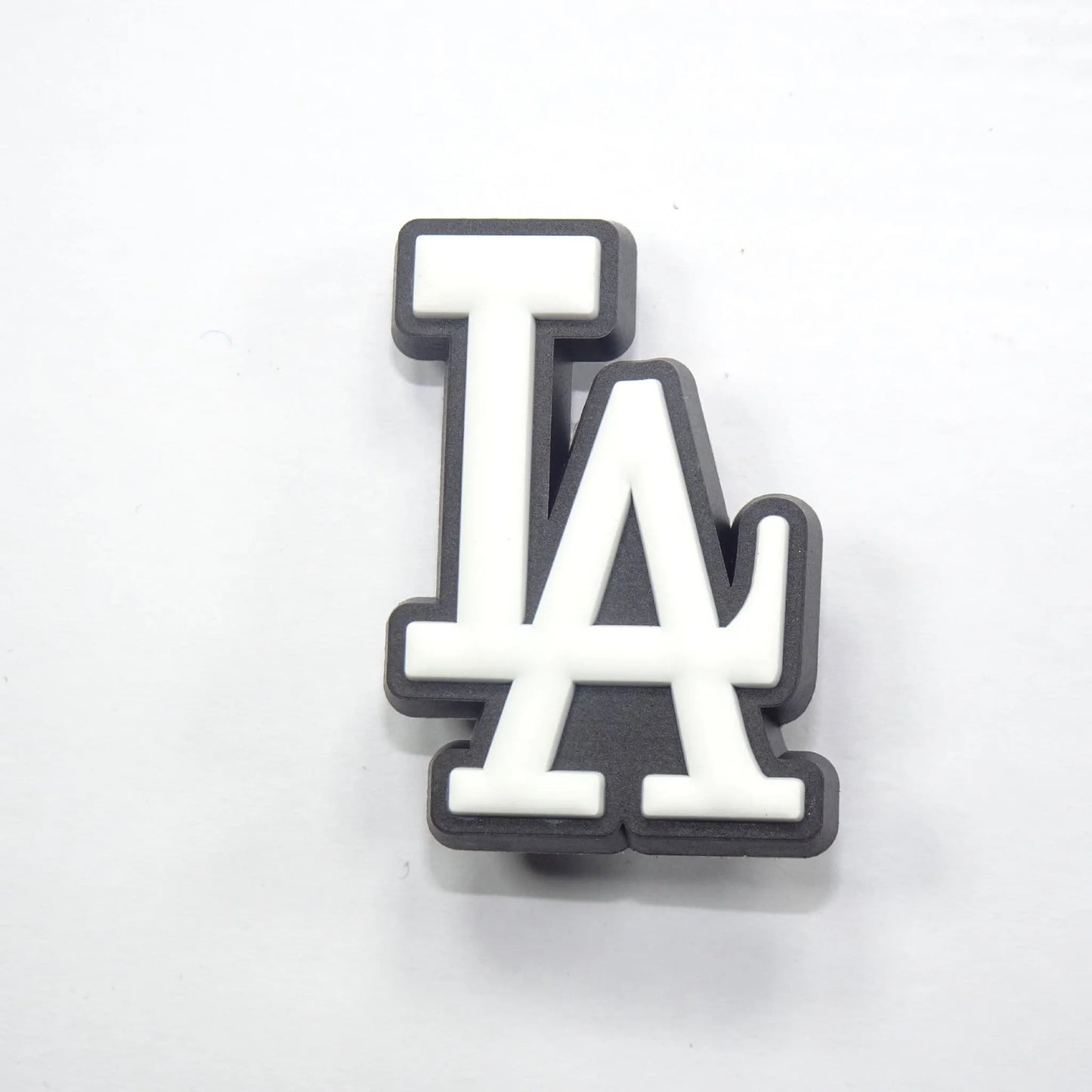 La Stylised Logo White On Black Shoe Charm