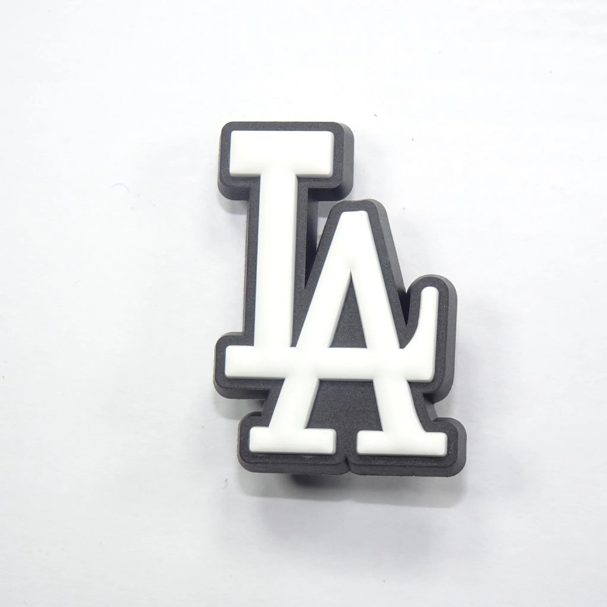 La Stylised Logo White On Black Shoe Charm