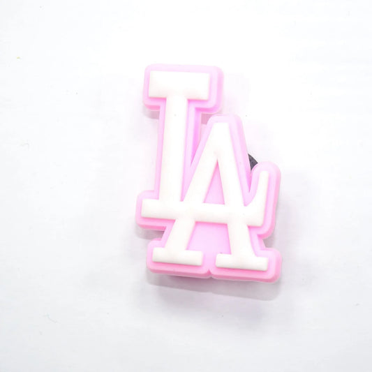 La Stylised Logo White On Pink Shoe Charm