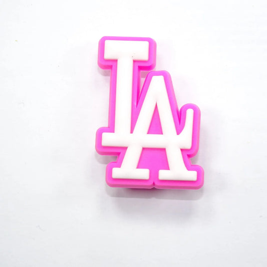 La Stylised Logo White On Dark Pink Shoe Charm