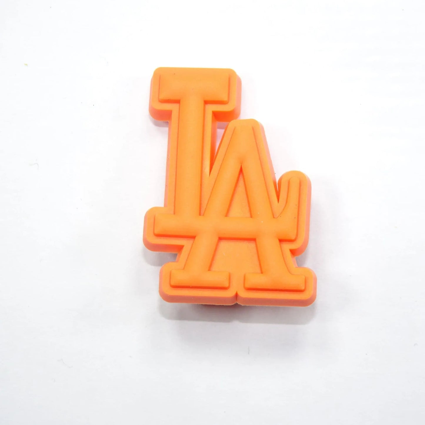 La Stylised Logo Orange Shoe Charm