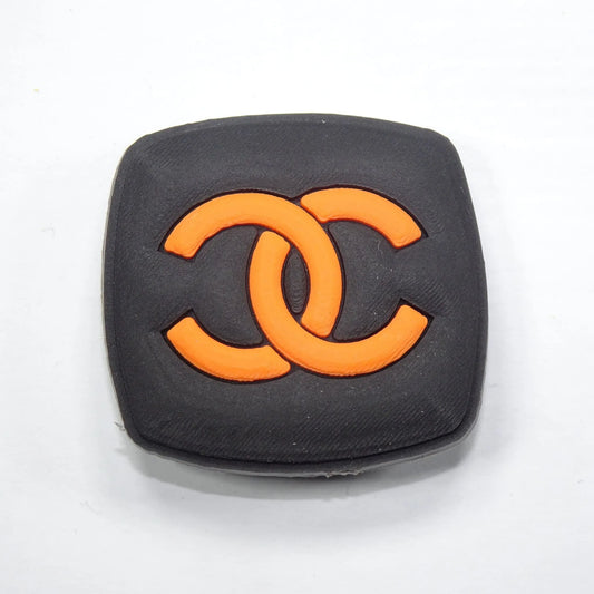Chanel Double C Badge Logo Orange On Black Shoe Charm