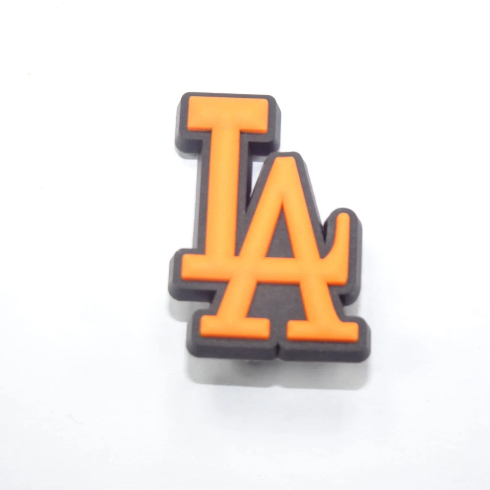 La Stylised Logo Orange On Black Shoe Charm