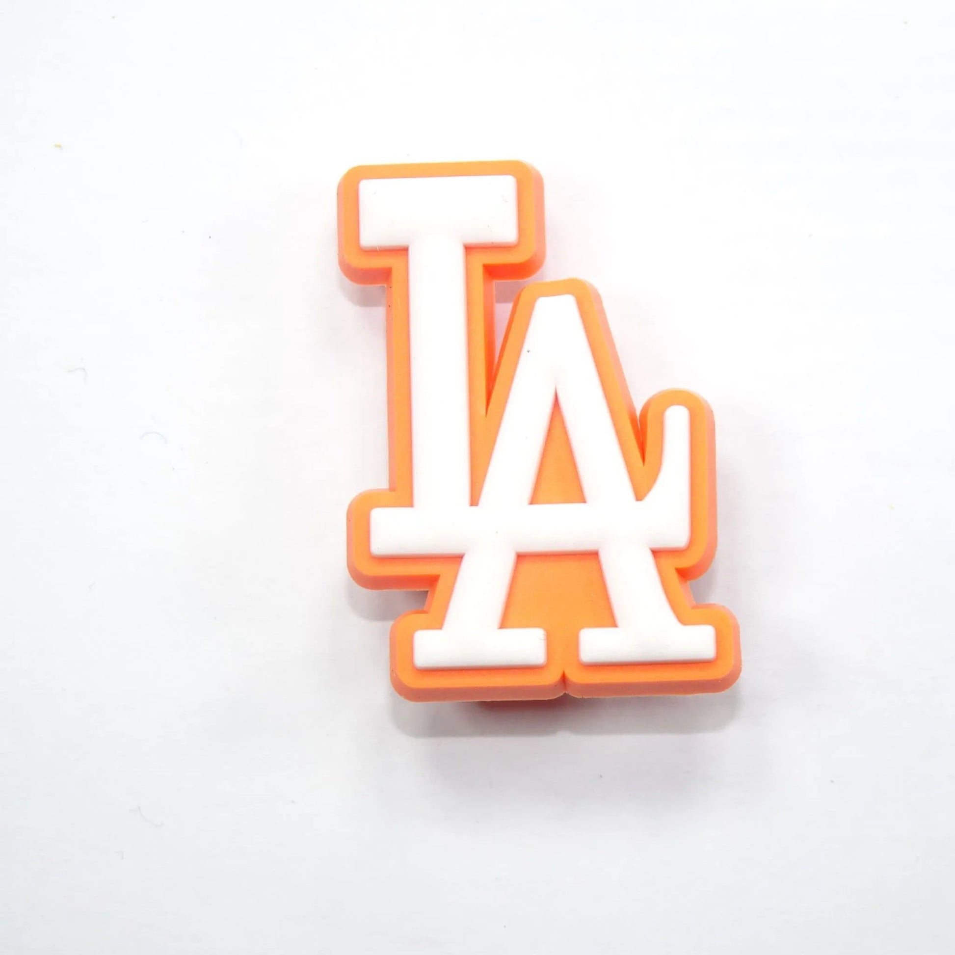 La Stylised Logo White On Orange Shoe Charm