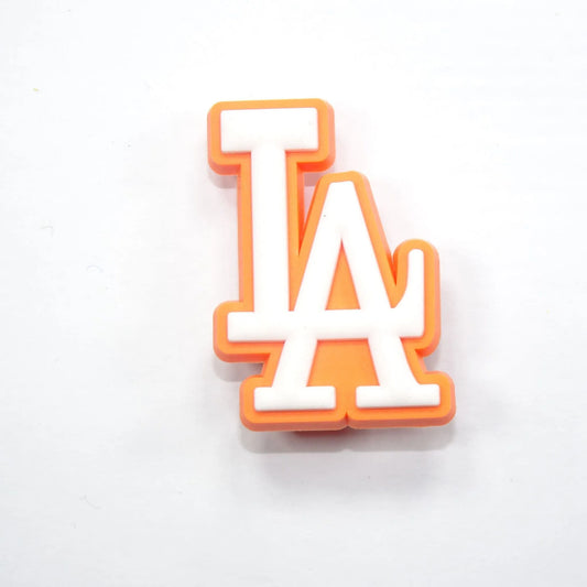 La Stylised Logo White On Orange Shoe Charm