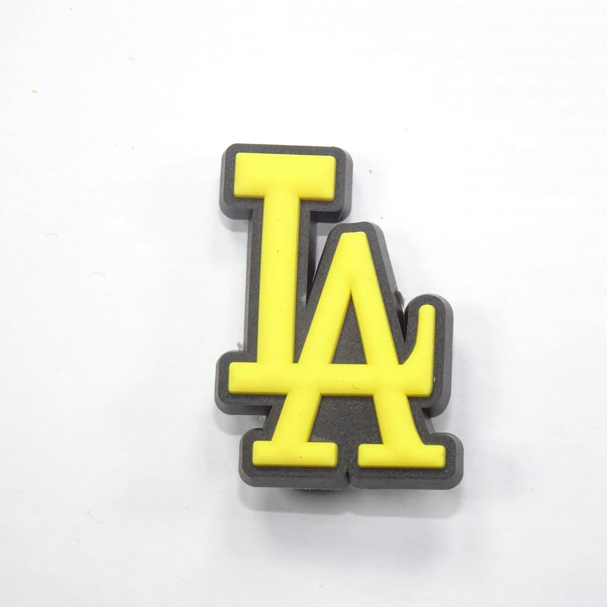 La Stylised Logo Yellow On Black Shoe Charm
