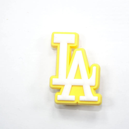 La Stylised Logo White On Yellow Shoe Charm