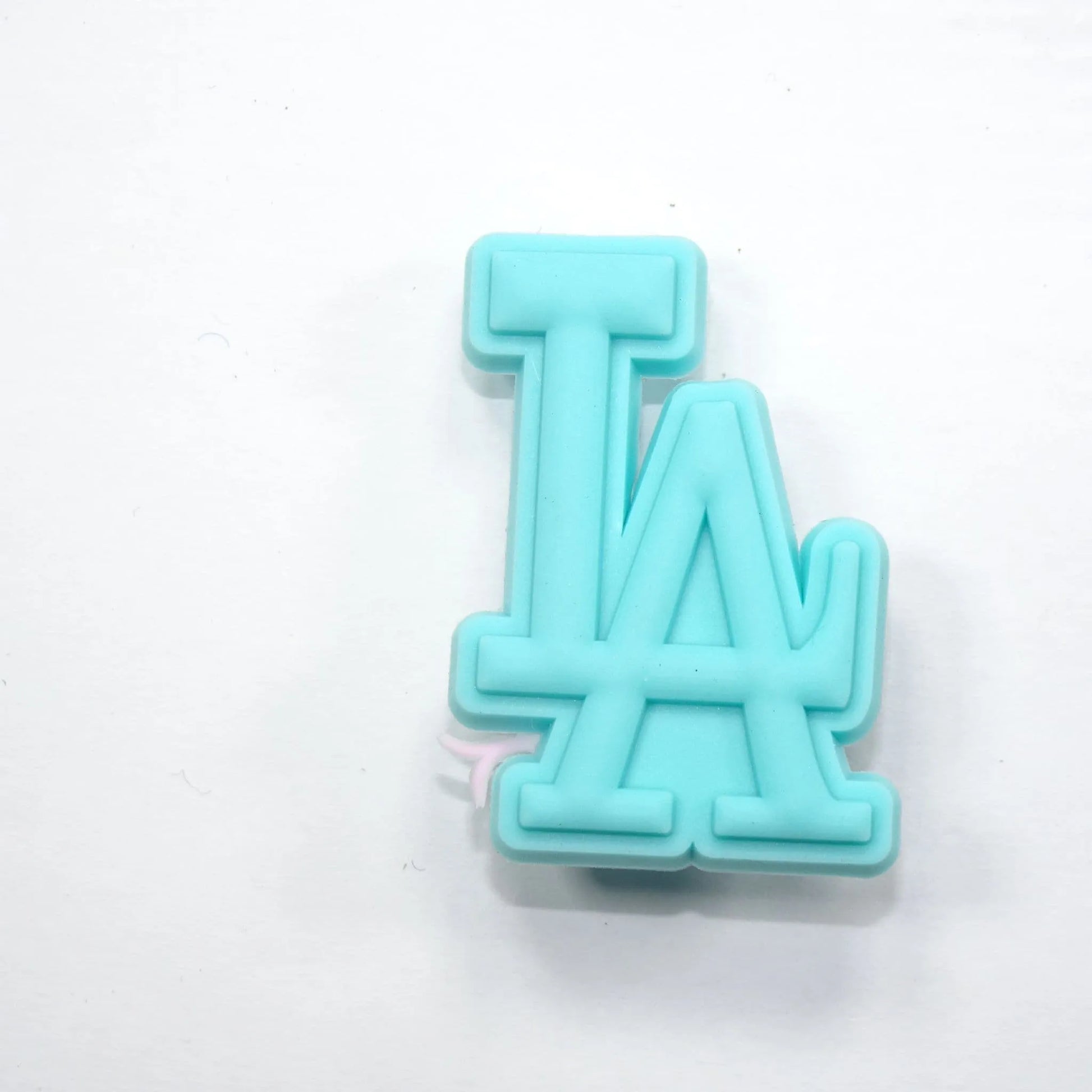 La Stylised Logo Aqua Shoe Charm