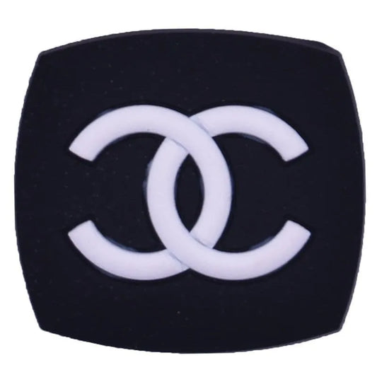 Cc Stylized White On Black Shaped Badge Shoe Charm