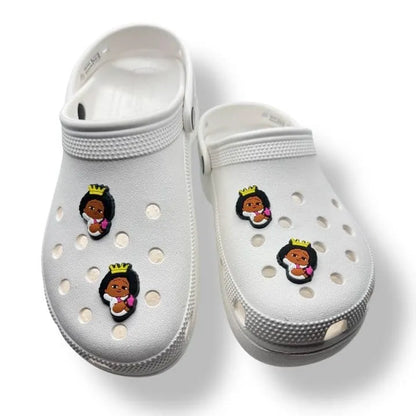 Little Girl wearing a Crown shoe charm BC