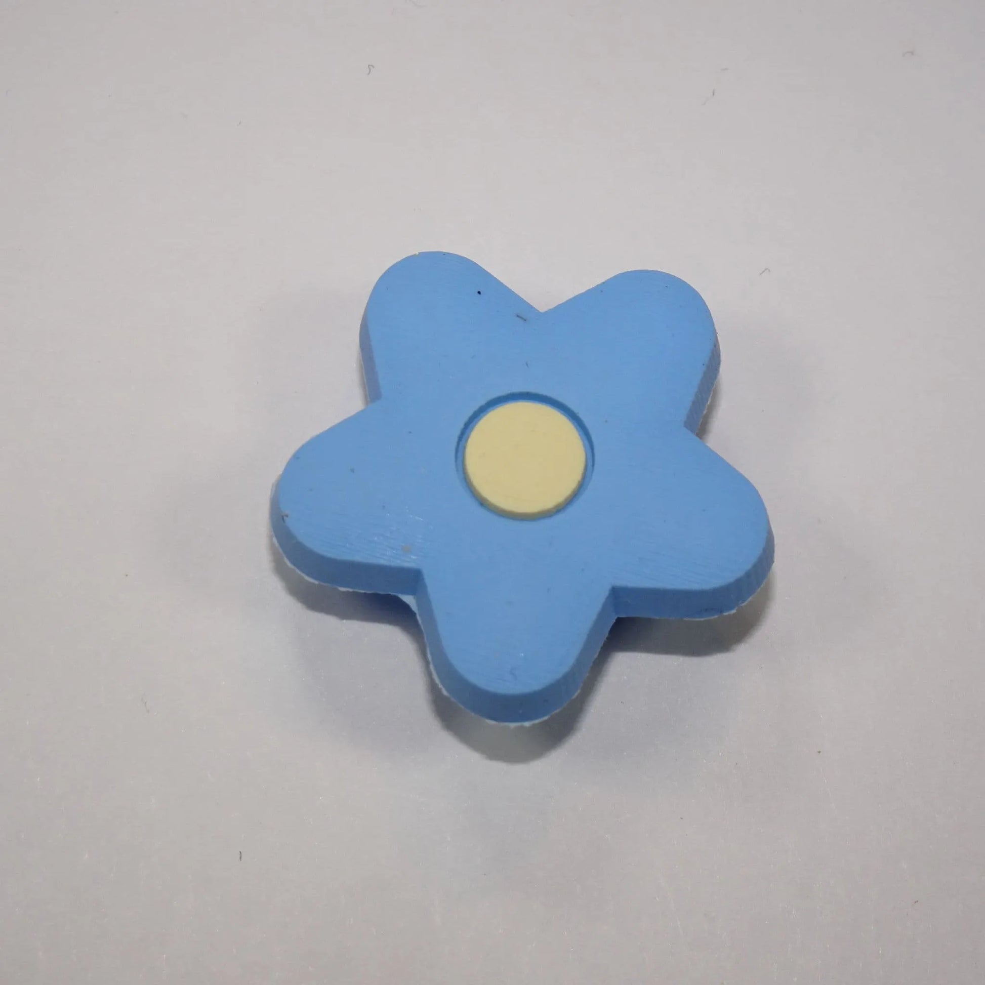 Blue/yellow star petals shoe charm BC