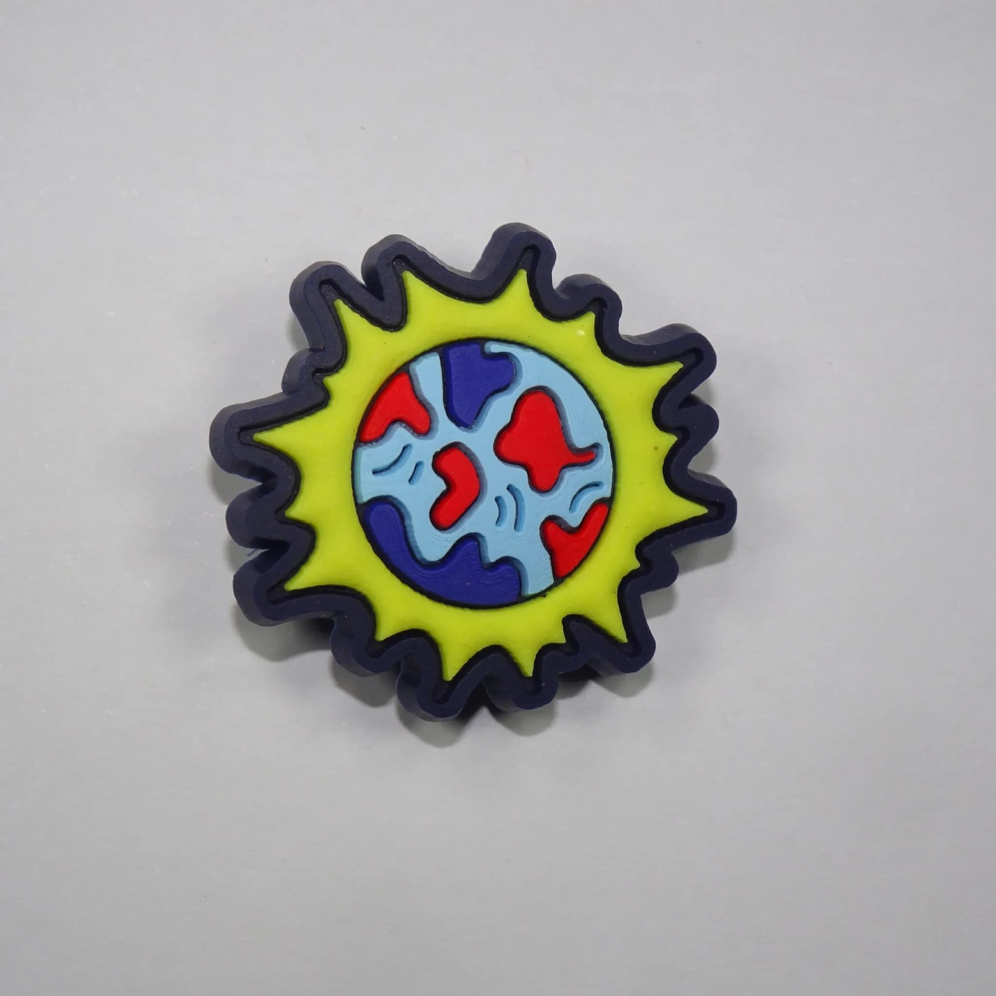 Golden Earth shoe charm BC