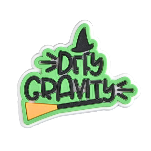 Defying gravity slogan witch shoe charm for Crocs — magical theatre fan clog charm compatible with all clog-style footwear UK